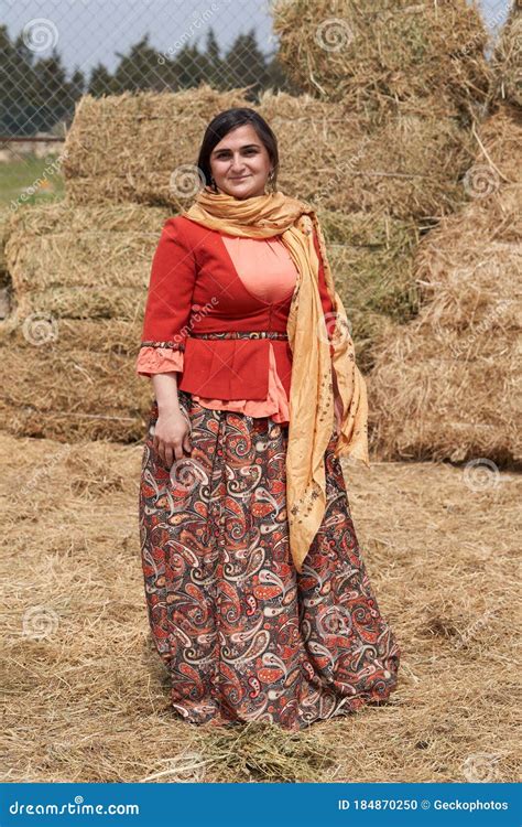 Young Azeri Woman In Traditional Azerbaijani Dress Standing At The Wooden Door Stock Photography ...