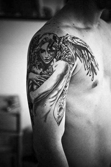 Angel tattoos for men and women and the meaning of the divine symbol