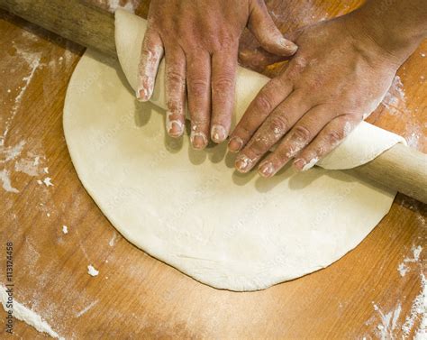 Manual rolling dough Stock Photo | Adobe Stock