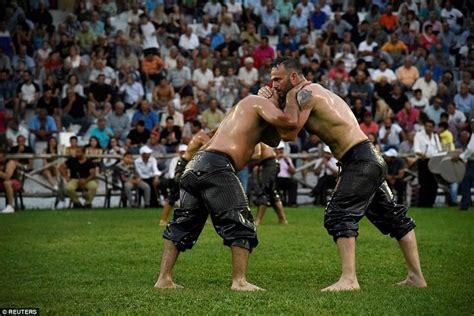 Greek wrestlers soaked in oil compete in traditional contest | Greek wrestling, Combat sport ...