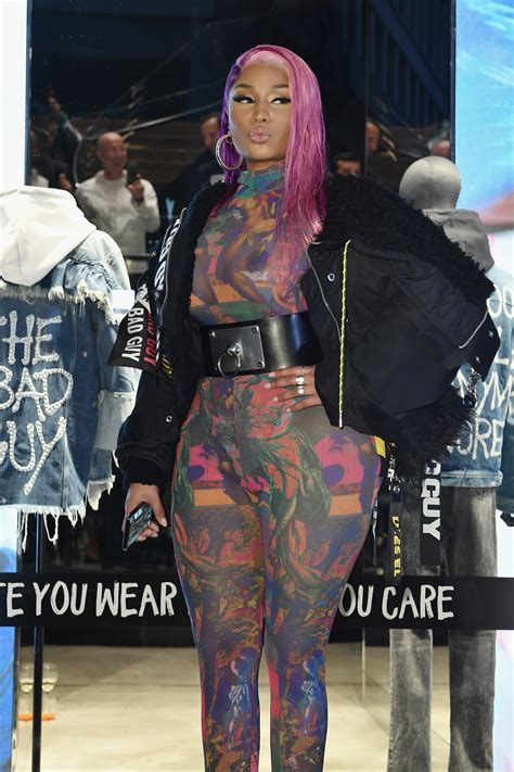 Nicki Minaj wows as she goes braless in sheer skintight bodystocking at launch of her fashion ...