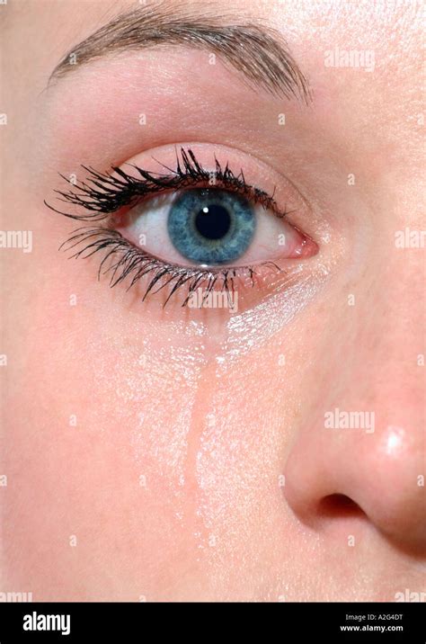 tear stain on woman's face Stock Photo - Alamy