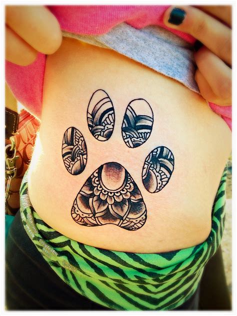 Paw print with a mandala in the middle | Paw print, Print tattoos, Tattoos