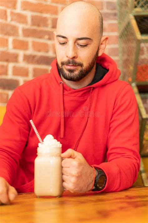 Bearded Male Sitting at the Table in Coffee Shop with a Cup of Coffee Stock Image - Image of ...