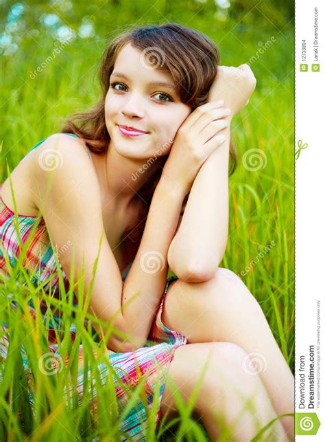 Pretty woman outdoor stock photo. Image of grass, outsides - 12733894