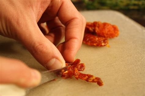 Dicing tomatoes | Erik dices sun dried tomatoes for walnut p… | jordanmit09 | Flickr