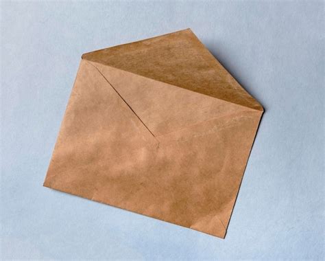 Premium Photo | Craft brown envelope open empty envelop