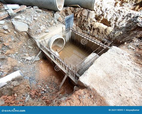 Utility Manhole Under Construction at a Construction Site. Editorial ...