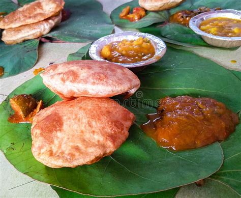 Traditional Indian Cuisine, Puri Bhaji Served on Green Leaves ...