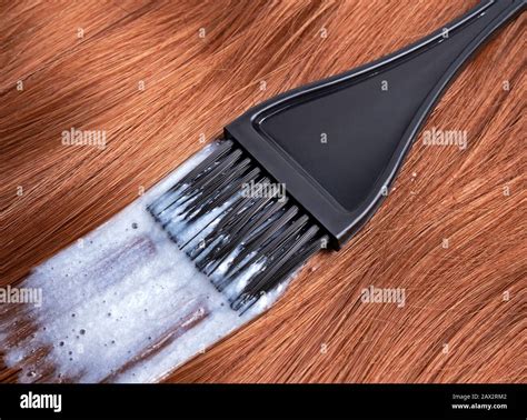 Process of dyeing hair Stock Photo - Alamy