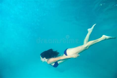 Woman diving underwater stock image. Image of horizontal - 33779655