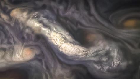 Scientists 'solve' mystery of Jupiter's colourful bands | Science, Climate & Tech News | Sky News