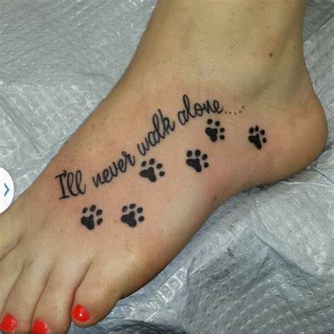 Paw print tat | Pawprint tattoo, Foot tattoos, Tattoos