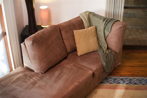 Free Stock Photo 8831 Comfortable couch with a woollen throw ...