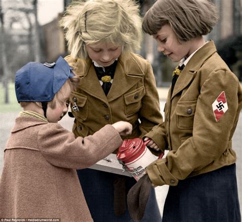 Striking colourised images capture children in wartime | Daily Mail Online