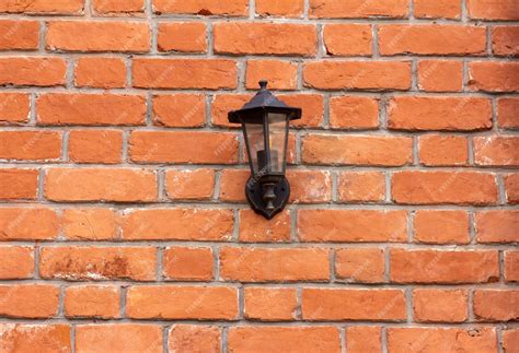 Premium Photo | Vintage street lamp on a brick wall