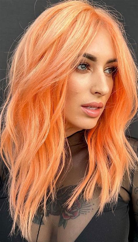 25 Peach Hair Colour Ideas That're Perfect For Summer : Bright Peach Shaggy