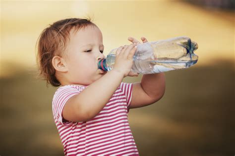 Child Drinking Water Bottle