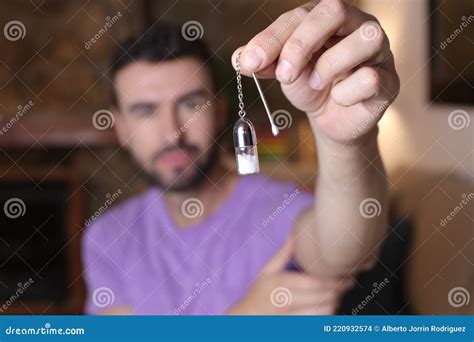 Man Holding White Substance in Glass Bottle with Spoon Stock Photo ...