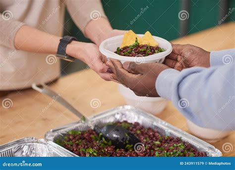 Feeding Hungry People stock image. Image of snack, beneficiaries - 243911579