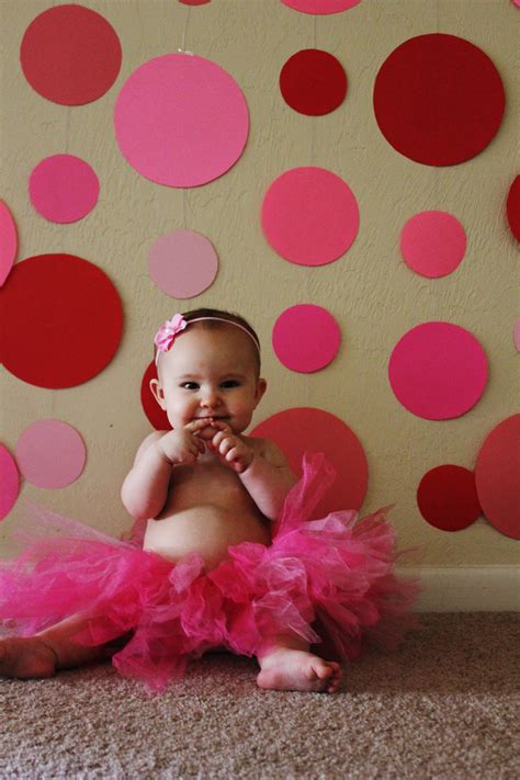 #baby #photography Make a fun backdrop with colored paper circles hung on string for baby photos ...