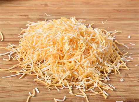 The Hidden Ingredient In Shredded Cheese — Eat This Not That