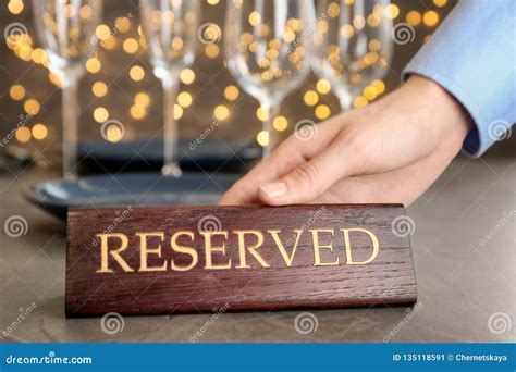Waiter Setting RESERVED Sign on Restaurant Table Stock Image - Image of card, catering: 135118591