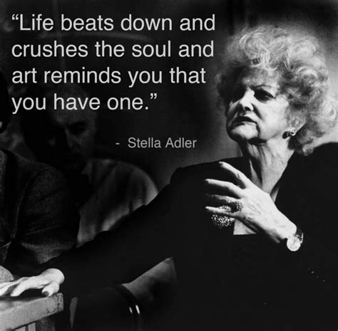 an older woman sitting at a table with a quote about life beats down ...