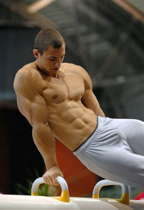 Male Athletes World: Gymnastics: Muscular gymnast photo - 1