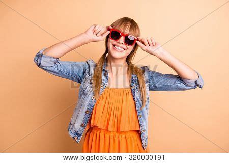 Pretty Overjoyed Lady Ready To Chill Wear Specs Casual Outfit Isolated Beige Background - Stock ...