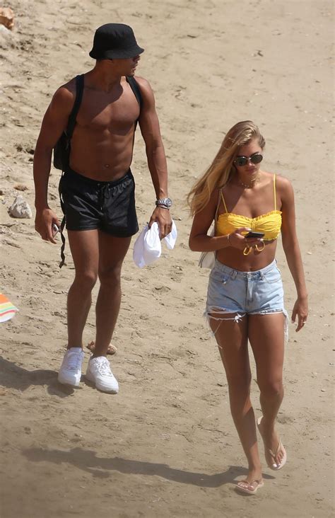 Arabella Chi and Wes Nelson - In a bikini spotted on a beach in Ibiza ...