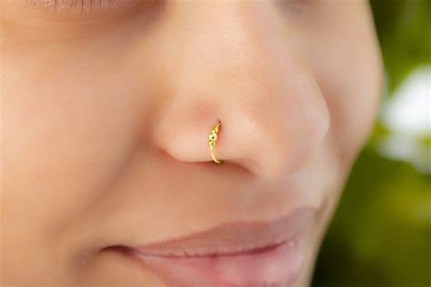 24G Gold Faux Nose Ring With White Opal | danielaboltres.de