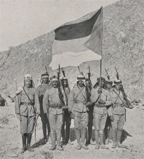 Soldiers of the Sharifian Army (Arab Army) during the Arab Revolt of 1916-1918 carrying the ...