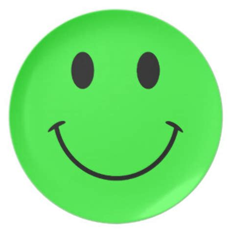 A Green Smiley Face With Two Black Eyes - vrogue.co