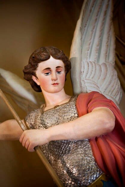 Premium Photo | Close up of an angel statue in a chapel