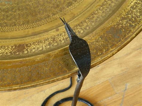 Wrought Iron Serpents Table with Hand Tooled Star Pattern on Brass Top For Sale at 1stDibs