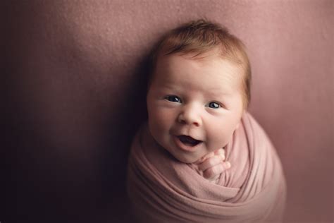 Smiling Newborn Baby
