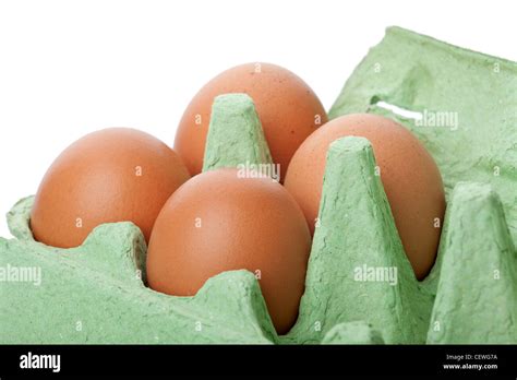 Brown eggs in green carton Stock Photo - Alamy