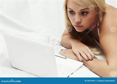 Beautiful Blond Girl on Bed with Laptop. Beauty Woman Stock Image - Image of makeup, laying ...