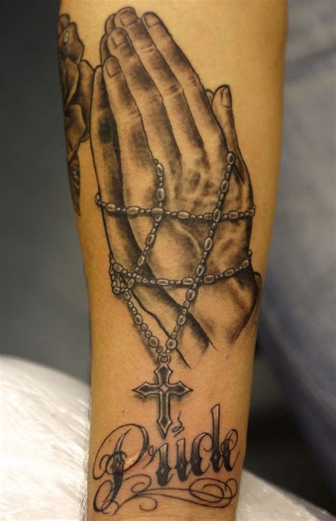 Rosary beads and praying hands Tattoo | Praying hands tattoo design, Hand tattoos pictures ...