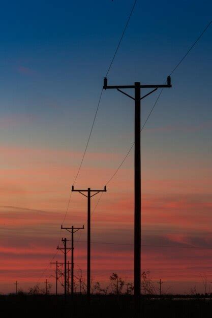 Premium Photo | Powerlines at sunset