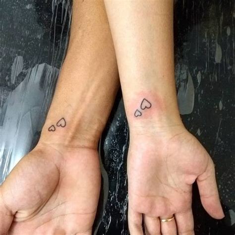 Discover the best mini heart tattoo on wrist ideas for your next ink