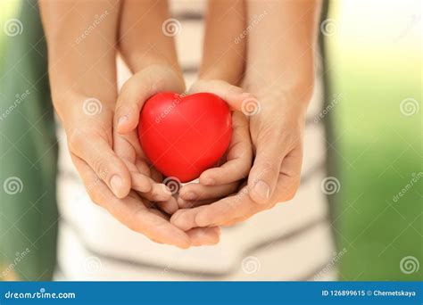 Adult and Child Hands Holding Heart Stock Image - Image of awareness, hope: 126899615