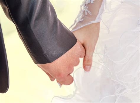 Wedding Couple Holding Hands Stock Image - Image of affectionate ...