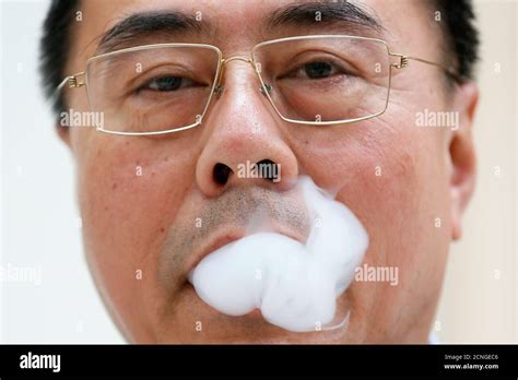 Chinese inventor of the e-cigarette Hon Lik poses for a photograph in ...