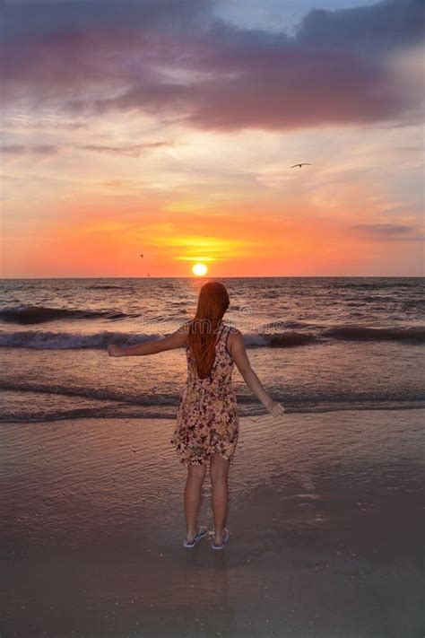 Happy Girl on the Beach at Sunset. Stock Photo - Image of comfortable, healthy: 55522980