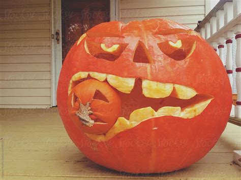 "A Pumpkin Eating Another Pumpkin" by Stocksy Contributor "Chelsea ...