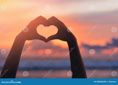 Hands Forming a Heart Shape with Sunset Silhouette Stock Photo - Image ...