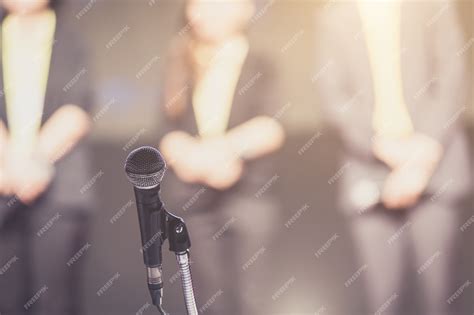 Premium Photo | Microphone with speaker on stage