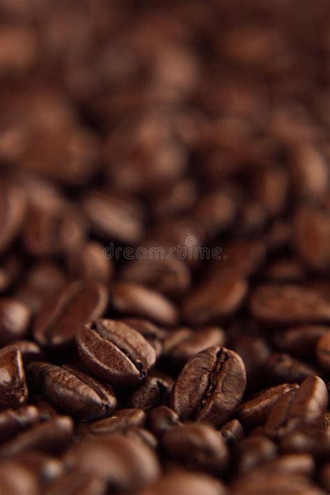 Roasted Coffee Beans Close-up with Blur Vertical Shot As Background. Stock Image - Image of ...